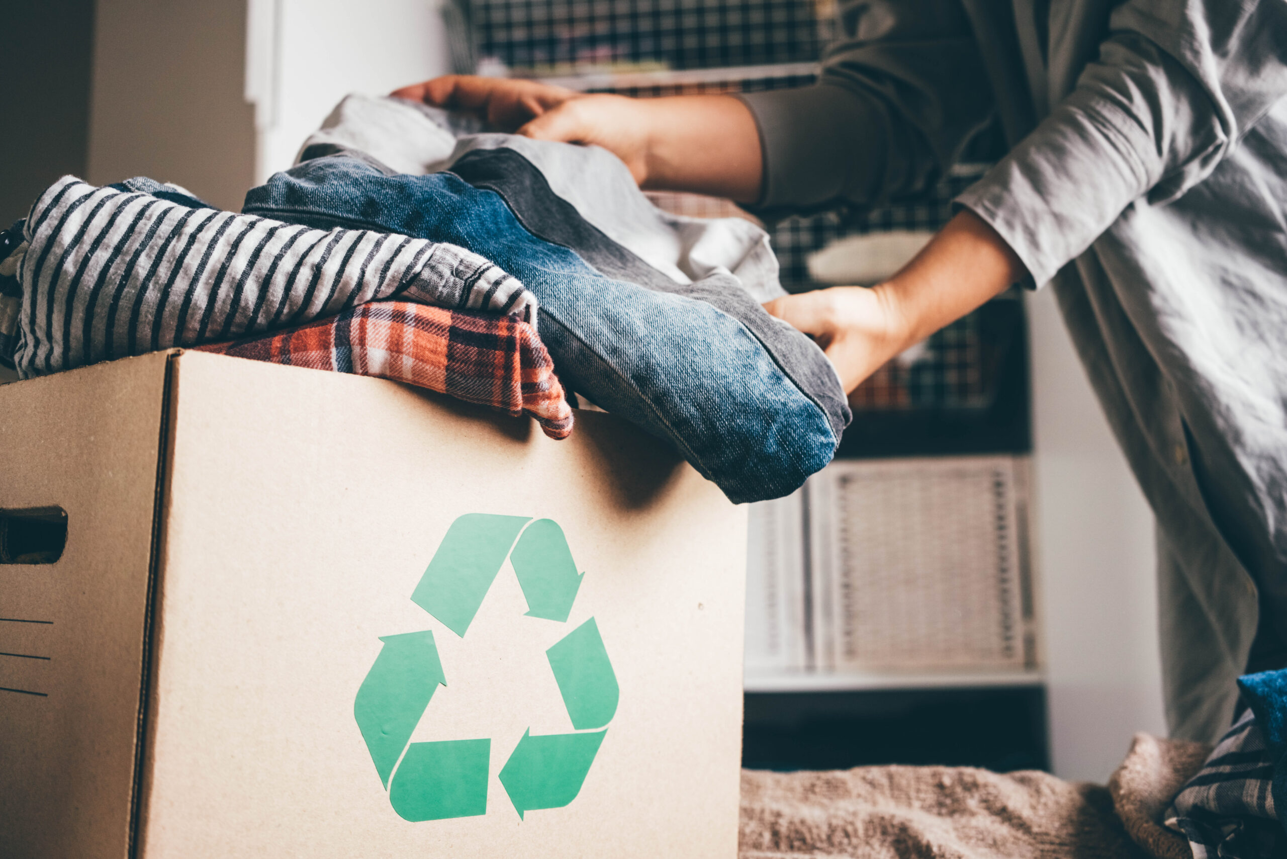 Recycle,Clothes,Concept.,Recycling,Box,Full,Of,Clothes.