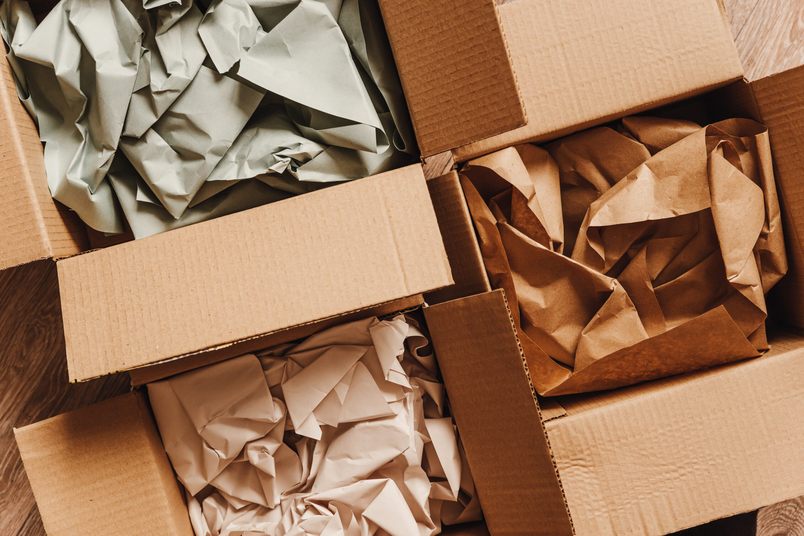 Cardboard,Boxes,With,Crumpled,Paper,Inside,For,Packaging,Goods,From